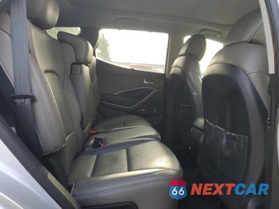 Zdjęcie 11 z 13 samochodu: 2014 HYUNDAI SANTA FE SPORT 2.0T VIN:5XYZW3LA6EG156606 - miniatura
