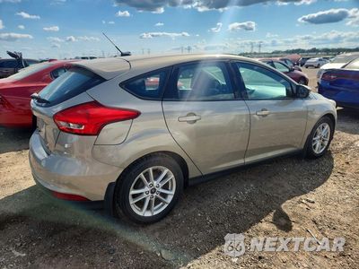 Trzecie zdjęcie samochodu z tyłu: 2016 FORD FOCUS SE VIN:1FADP3K27GL264585 - miniatura