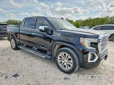 Czwarte zdjęcie samochodu z boku: 2021 GMC SIERRA K1500 DENALI VIN:3GTU9FEDXMG207812 - miniatura
