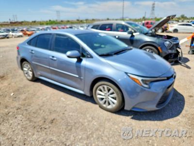 Czwarte zdjęcie samochodu z boku: 2024 TOYOTA COROLLA HYBRID LE VIN:JTDBDMHE2RJ009682 - miniatura