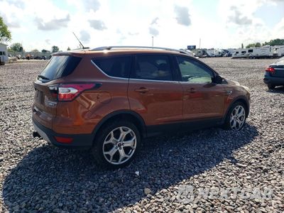 Trzecie zdjęcie samochodu z tyłu: 2017 FORD ESCAPE TITANIUM VIN:1FMCU9J93HUA74726 - miniatura