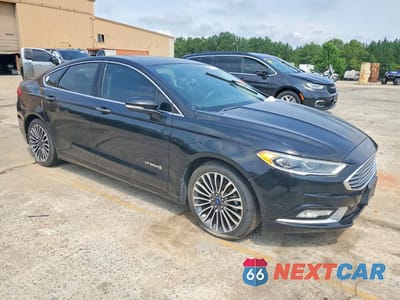 Czwarte zdjęcie samochodu z boku: 2018 FORD FUSION TITANIUM/PLATINUM HEV VIN:3FA6P0RU2JR102774 - miniatura