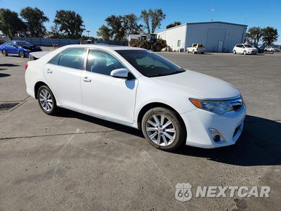 Czwarte zdjęcie samochodu z boku: 2014 TOYOTA CAMRY XLE VIN:4T4BF1FK3ER397596 - miniatura