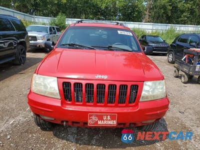 Piąte zdjęcie samochodu w środku: 1999 JEEP GRAND CHEROKEE LIMITED VIN:1J4GW68NXXC702510 - miniatura