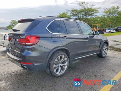 Trzecie zdjęcie samochodu z tyłu: 2014 BMW X5 SDRIVE35I VIN:5UXKR2C57E0H33415 - miniatura