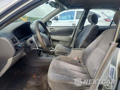 Zdjęcie 7 z 12 samochodu: 2001 TOYOTA COROLLA LE VIN:2T1BR12E11C393818 - miniatura