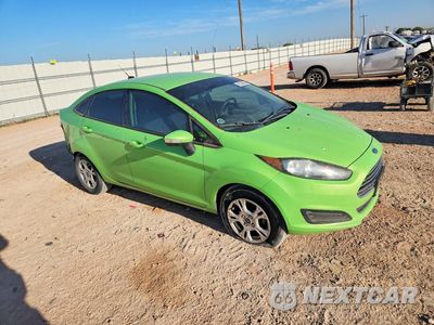 Czwarte zdjęcie samochodu z boku: 2014 FORD FIESTA SE VIN:3FADP4BJ1EM211938 - miniatura
