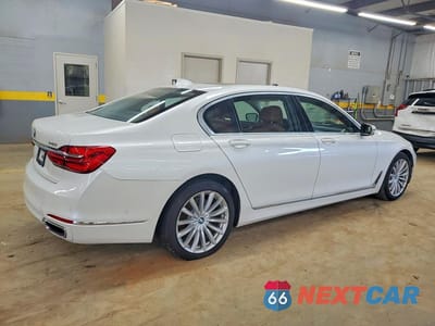 Trzecie zdjęcie samochodu z tyłu: 2018 BMW 740 I VIN:WBA7E2C53JG743146 - miniatura