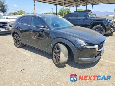 Czwarte zdjęcie samochodu z boku: 2024 MAZDA CX-30 SELECT VIN:3MVDMBBM7RM644332 - miniatura