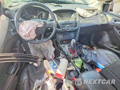 Zdjęcie 8 z 14 samochodu: 2017 FORD FOCUS TITANIUM VIN:1FADP3N29HL272524 - miniatura