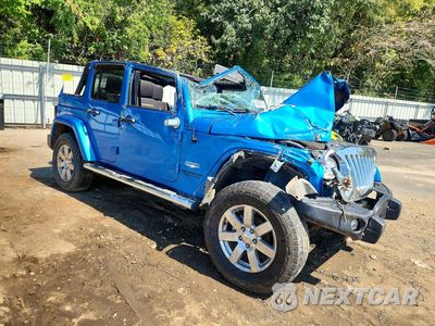 Czwarte zdjęcie samochodu z boku: 2015 JEEP WRANGLER UNLIMITED SAHARA VIN:1C4BJWEG3FL588952 - miniatura