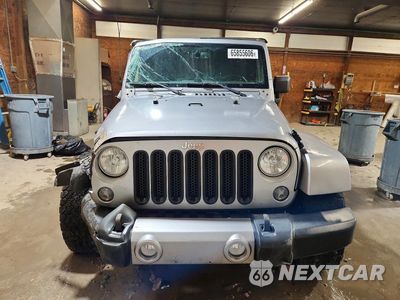 Piąte zdjęcie samochodu w środku: 2016 JEEP WRANGLER UNLIMITED SAHARA VIN:1C4BJWEG1GL103791 - miniatura
