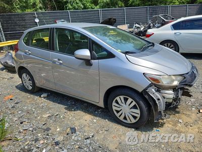 Czwarte zdjęcie samochodu z boku: 2017 HONDA FIT LX VIN:JHMGK5H57HS009783 - miniatura