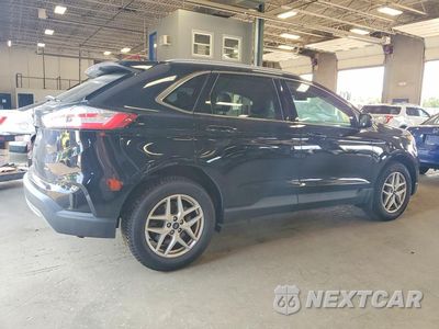 Trzecie zdjęcie samochodu z tyłu: 2021 FORD EDGE SEL VIN:2FMPK4J94MBA33712 - miniatura