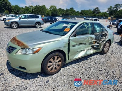 2007 TOYOTA CAMRY HYBRID JTNBB46K073021390 - główne zdjęcie licytacji z USA - miniatura