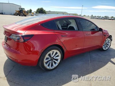 Trzecie zdjęcie samochodu z tyłu: 2023 TESLA MODEL 3 VIN:5YJ3E1EA3PF461890 - miniatura
