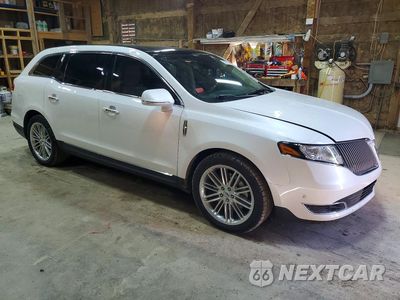 Czwarte zdjęcie samochodu z boku: 2016 LINCOLN MKT VIN:2LMHJ5AT3GBL03126 - miniatura