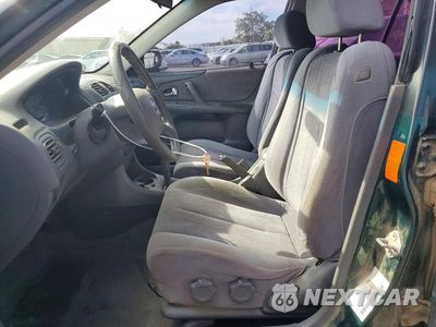 Zdjęcie 7 z 12 samochodu: 2000 MAZDA PROTEGE ES VIN:JM1BJ2238Y0239347 - miniatura