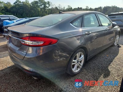 Trzecie zdjęcie samochodu z tyłu: 2018 FORD FUSION HYBRID SE VIN:3FA6P0LU7JR192805 - miniatura