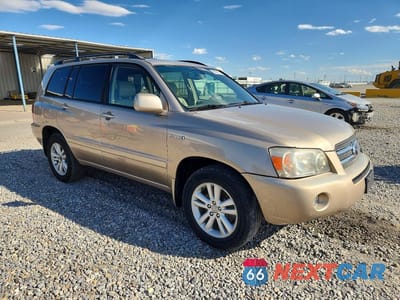 Czwarte zdjęcie samochodu z boku: 2006 TOYOTA HIGHLANDER HYBRID VIN:JTEEW21A360023669 - miniatura