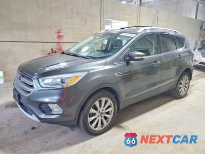 2017 FORD ESCAPE TITANIUM 1FMCU9J97HUB33454 - główne zdjęcie licytacji z USA - miniatura