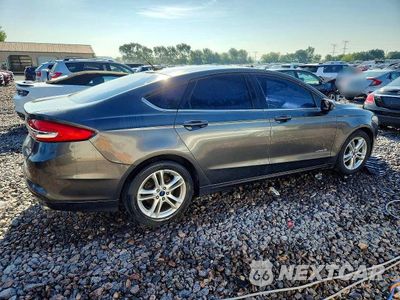 Trzecie zdjęcie samochodu z tyłu: 2018 FORD FUSION SE HYBRID VIN:3FA6P0LU4JR147580 - miniatura