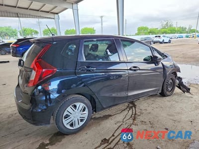 Trzecie zdjęcie samochodu z tyłu: 2019 HONDA FIT LX VIN:3HGGK5H40KM706819 - miniatura