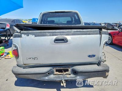 Zdjęcie 6 z 12 samochodu: 2002 FORD F150 SUPERCREW VIN:1FTRW07602KB56692 - miniatura
