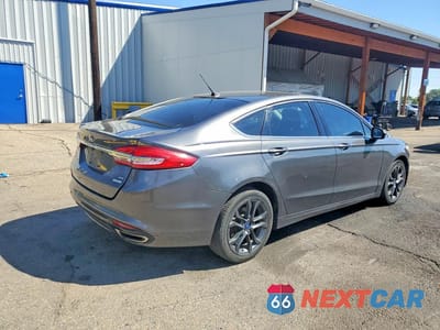 Trzecie zdjęcie samochodu z tyłu: 2018 FORD FUSION SE VIN:3FA6P0T9XJR262535 - miniatura