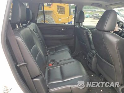 Zdjęcie 10 z 12 samochodu: 2019 HONDA PILOT TOURING VIN:5FNYF6H94KB034552 - miniatura