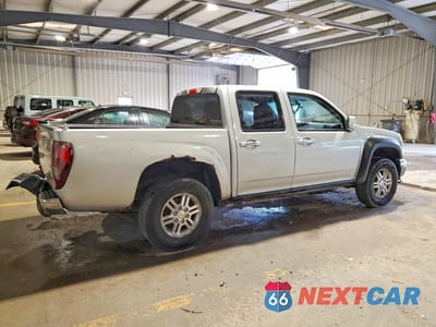 Trzecie zdjęcie samochodu z tyłu: 2011 GMC CANYON SLE VIN:1GTH6MFE3B8128636 - miniatura