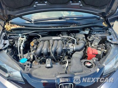 Zdjęcie 11 z 12 samochodu: 2017 HONDA FIT LX VIN:JHMGK5H56HS000167 - miniatura