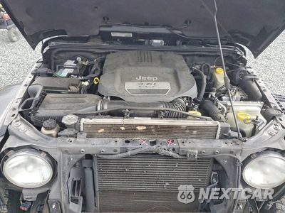 Zdjęcie 12 z 13 samochodu: 2013 JEEP WRANGLER UNLIMITED SAHARA VIN:1C4BJWEG4DL688457 - miniatura