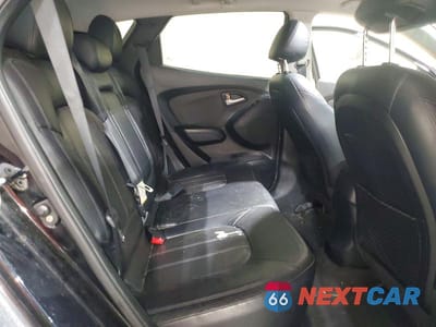 Zdjęcie 11 z 13 samochodu: 2010 HYUNDAI TUCSON LIMITED VIN:KM8JUCAC4AU085336 - miniatura