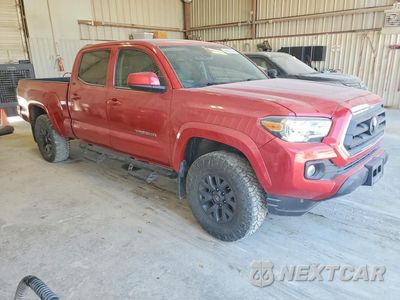 Czwarte zdjęcie samochodu z boku: 2021 TOYOTA TACOMA SR5 V6 VIN:3TMBZ5DN6MM028504 - miniatura