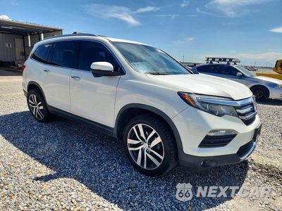 Czwarte zdjęcie samochodu z boku: 2016 HONDA PILOT TOURING VIN:5FNYF5H90GB011528 - miniatura