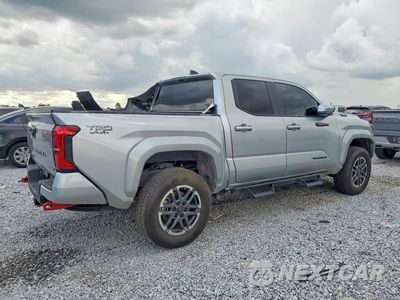 Trzecie zdjęcie samochodu z tyłu: 2026 TOYOTA TACOMA TRD SPORT HV VIN:3TYLC5LN5TT055607 - miniatura