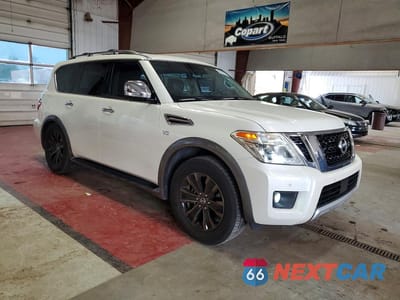 Czwarte zdjęcie samochodu z boku: 2017 NISSAN ARMADA PLATINUM VIN:JN8AY2NE8H9707999 - miniatura
