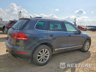 Trzecie zdjęcie samochodu z tyłu: 2014 VOLKSWAGEN TOUAREG V6 TDI VIN:WVGEP9BP3ED013157 - miniatura