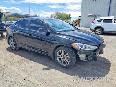 Czwarte zdjęcie samochodu z boku: 2017 HYUNDAI ELANTRA SE VIN:KMHD84LF6HU412702 - miniatura