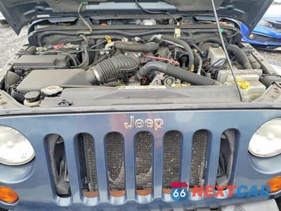 Zdjęcie 11 z 12 samochodu: 2008 JEEP WRANGLER SAHARA VIN:1J4FA54158L567140 - miniatura