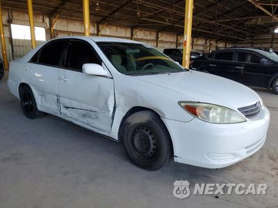 Czwarte zdjęcie samochodu z boku: 2002 TOYOTA CAMRY LE VIN:4T1BE32K82U080293 - miniatura