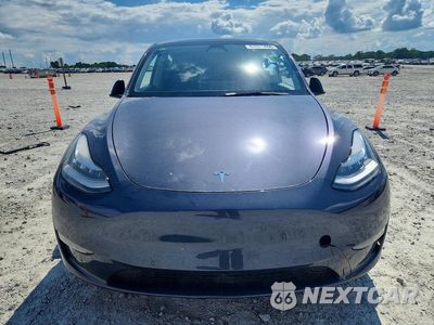 Piąte zdjęcie samochodu w środku: 2021 TESLA MODEL Y VIN:5YJYGDEEXMF244529 - miniatura