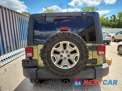 Zdjęcie 6 z 12 samochodu: 2013 JEEP WRANGLER UNLIMITED RUBICON VIN:1C4HJWFG5DL561032 - miniatura