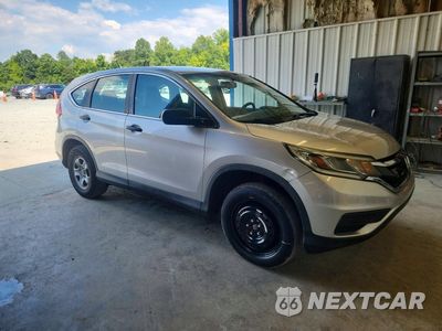 Czwarte zdjęcie samochodu z boku: 2015 HONDA CR-V LX VIN:5J6RM4H3XFL131018 - miniatura