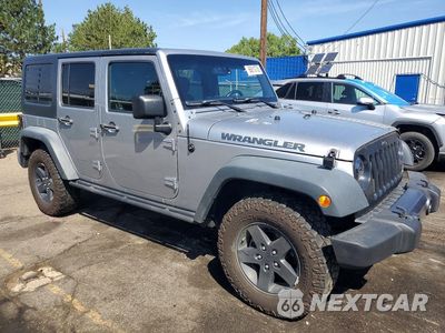 Czwarte zdjęcie samochodu z boku: 2016 JEEP WRANGLER UNLIMITED SPORT VIN:1C4BJWDG1GL114078 - miniatura