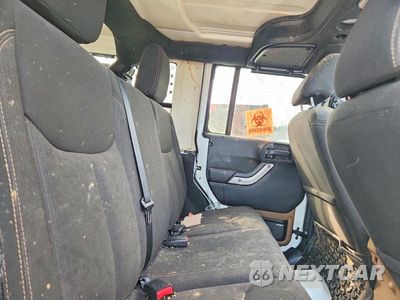 Zdjęcie 11 z 13 samochodu: 2015 JEEP WRANGLER UNLIMITED SAHARA VIN:1C4BJWEG2FL675502 - miniatura
