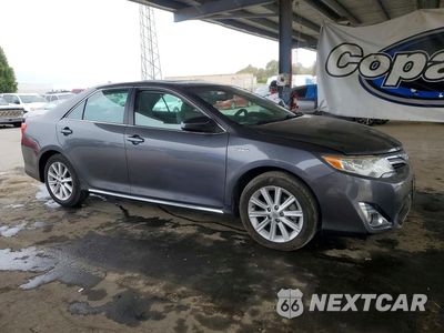Czwarte zdjęcie samochodu z boku: 2014 TOYOTA CAMRY HYBRID XLE VIN:4T1BD1FK0EU109162 - miniatura