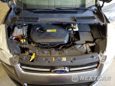 Zdjęcie 12 z 13 samochodu: 2014 FORD ESCAPE TITANIUM VIN:1FMCU9JX0EUB13489 - miniatura