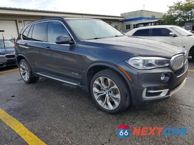 Czwarte zdjęcie samochodu z boku: 2014 BMW X5 SDRIVE35I VIN:5UXKR2C57E0H33415 - miniatura